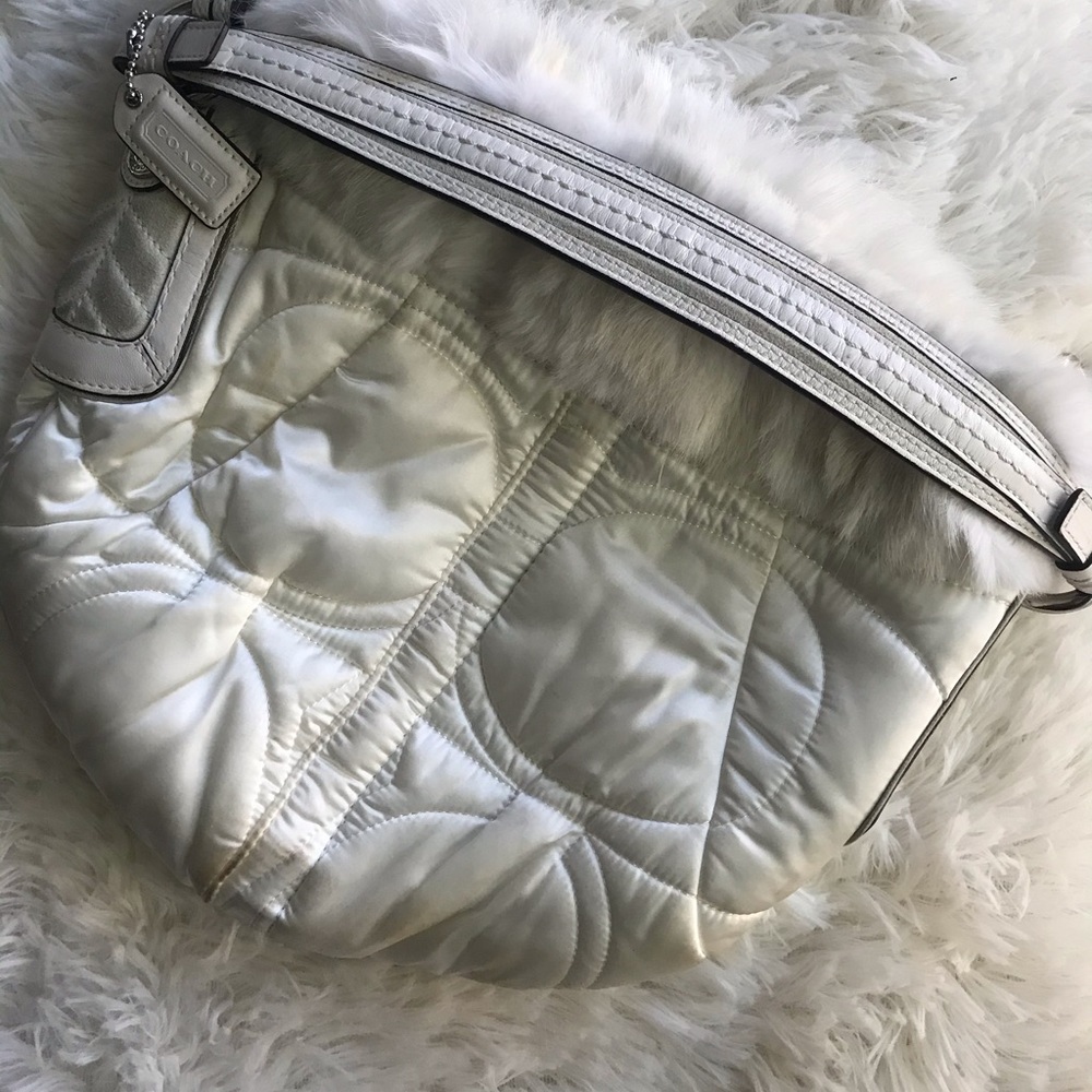 Coach quilted outline color; white fur purse